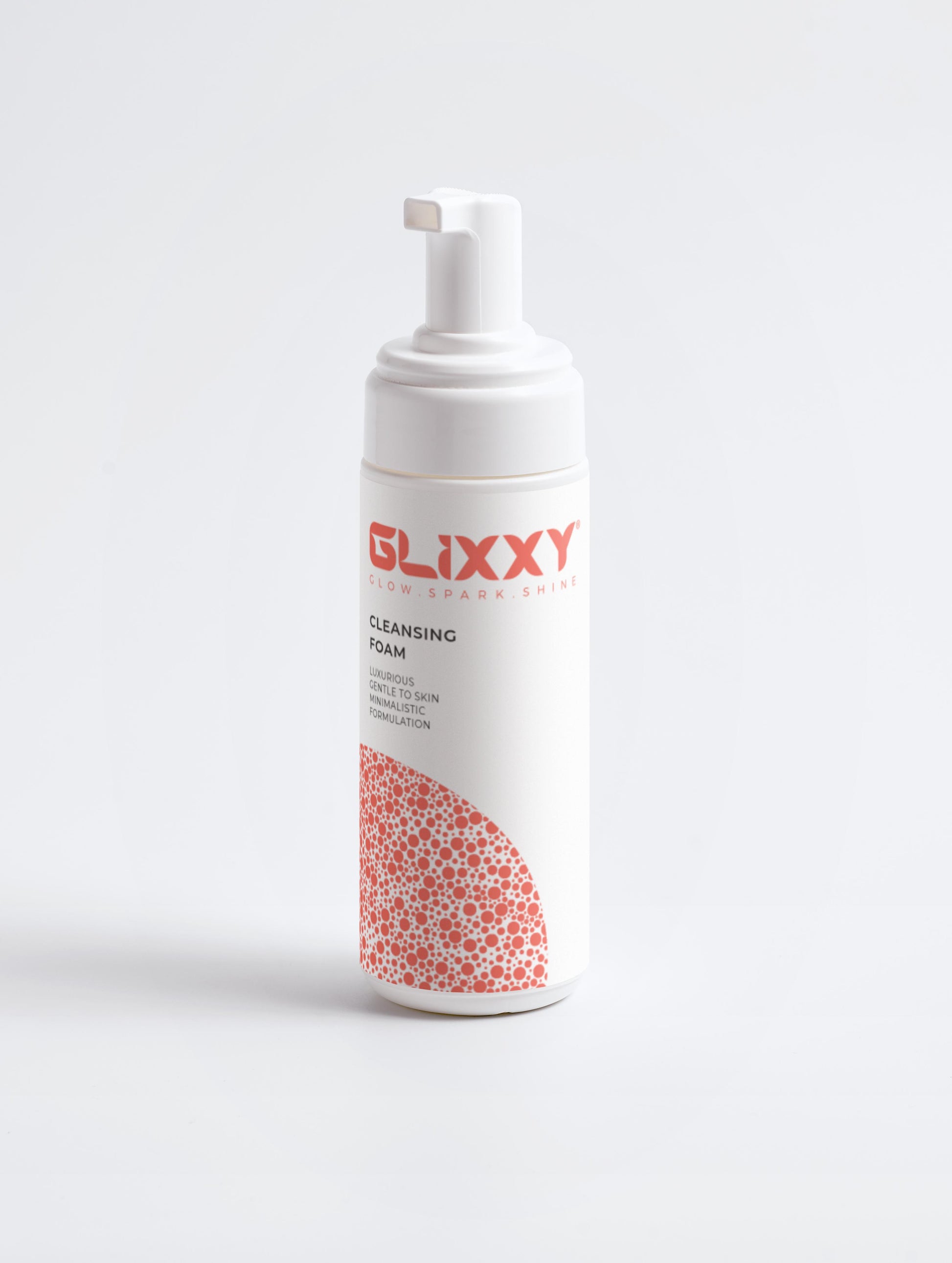 Glixxy cleansing foam bottle on a white background
