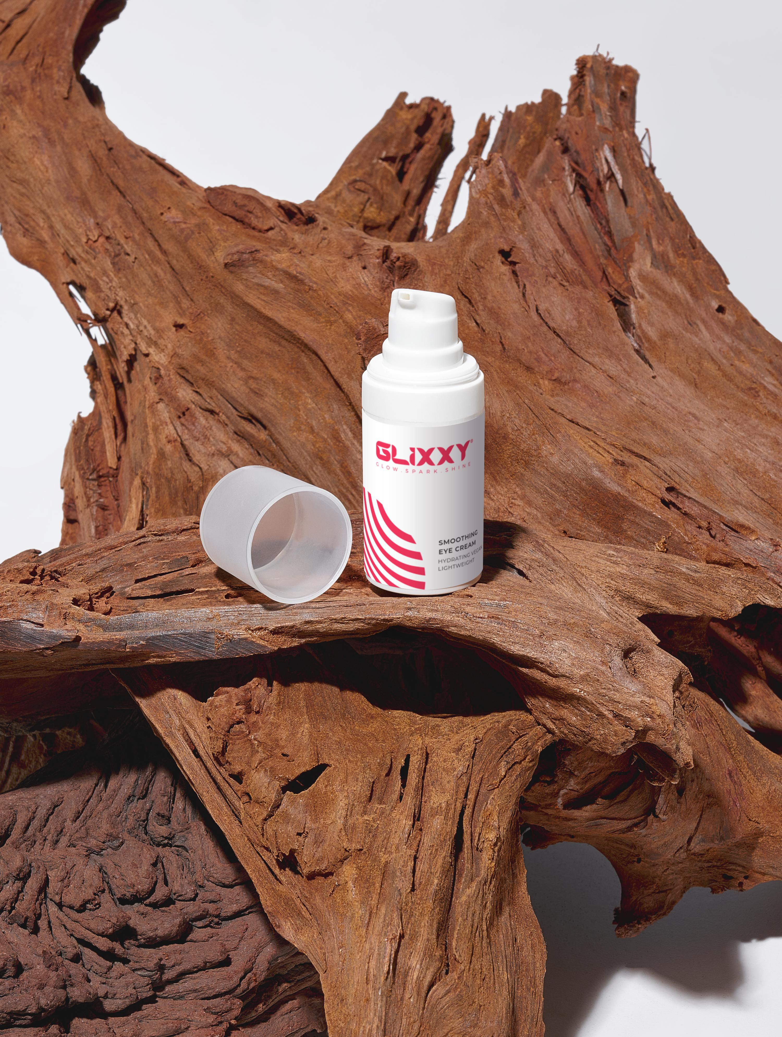 Glixxy bottle with a white cap on a wooden surface