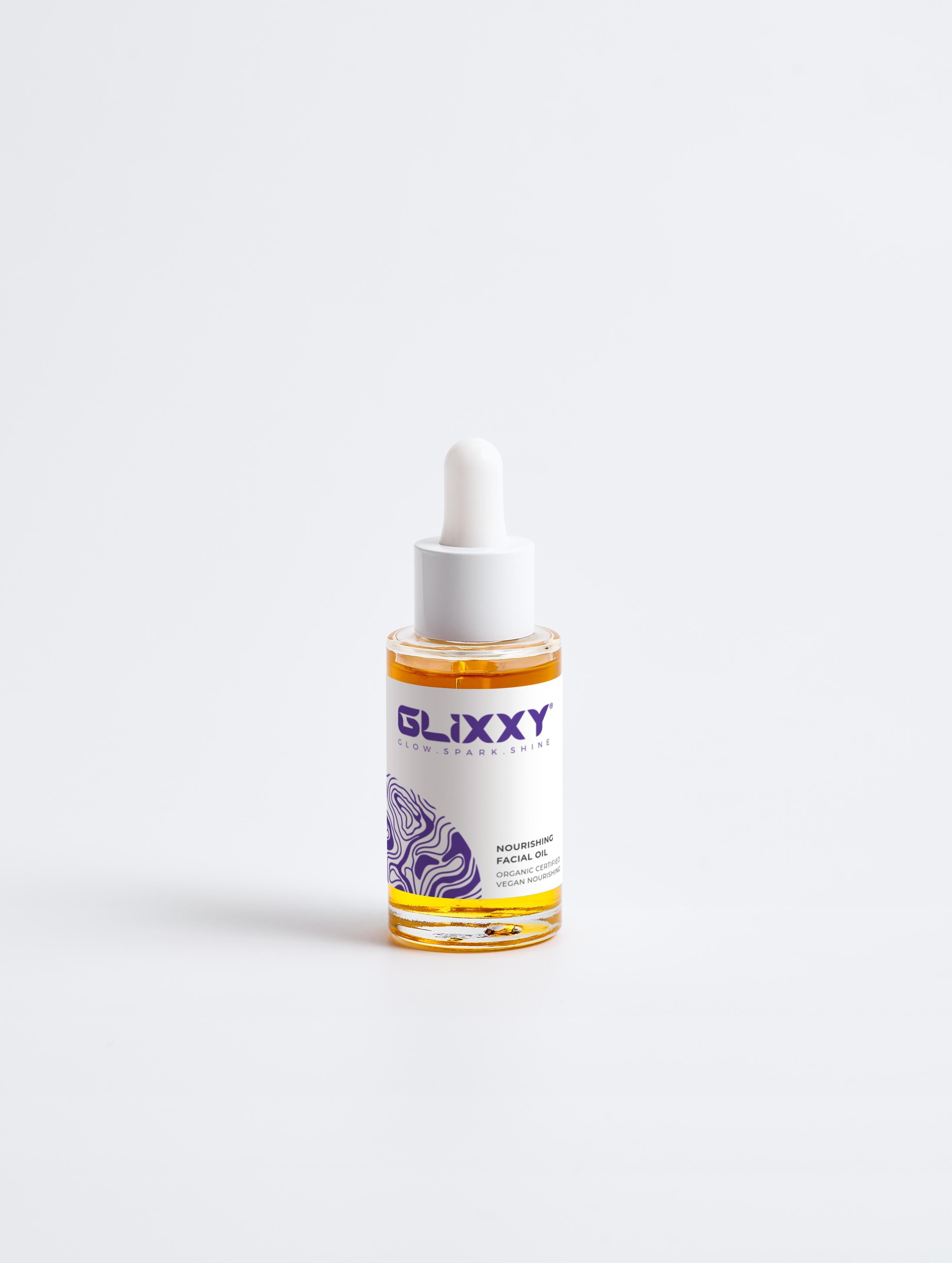 Glixxy nourishing facial oil dropper bottle on a white background