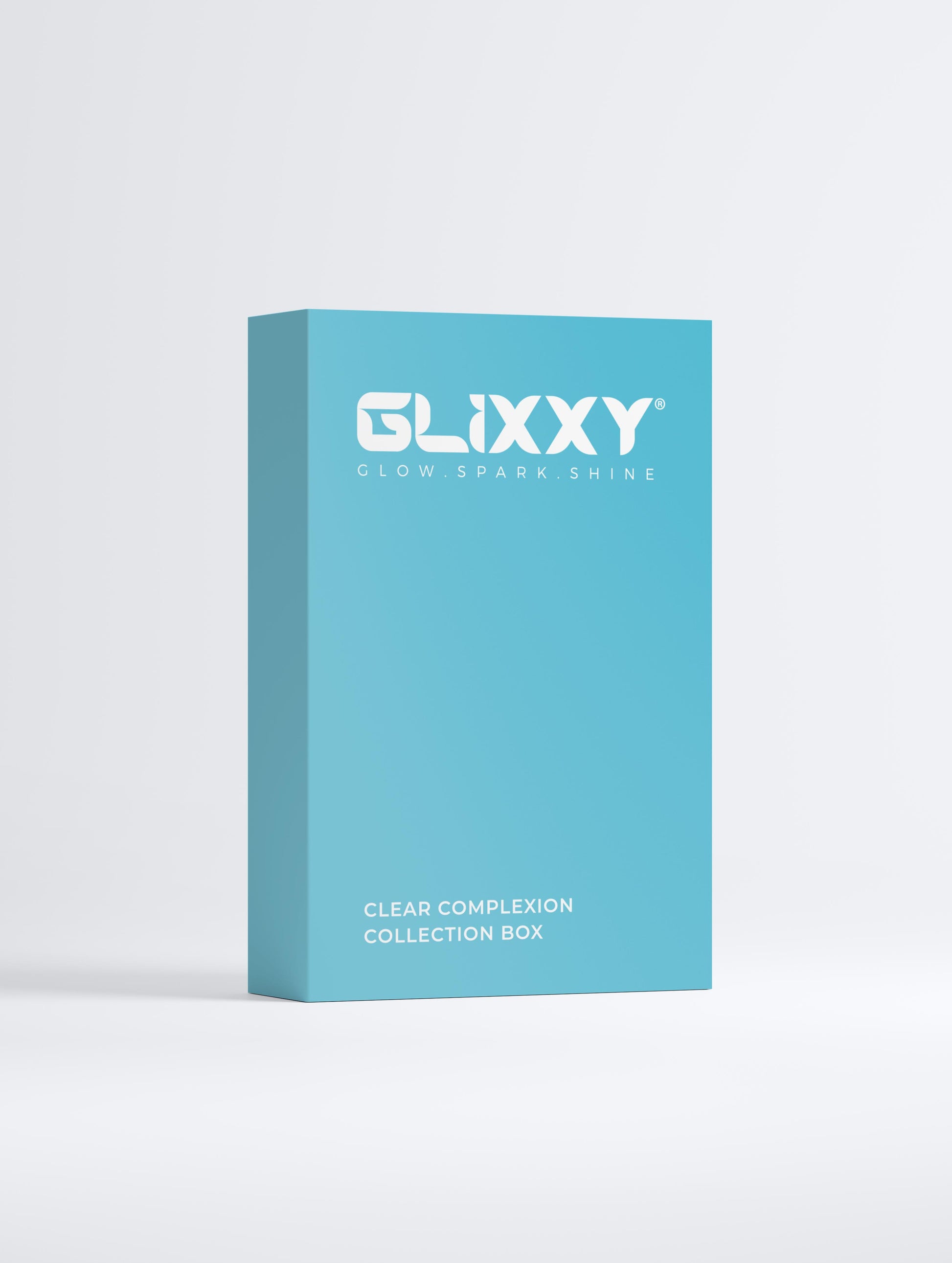 Glixxy clear complexion collection box on a light gray background