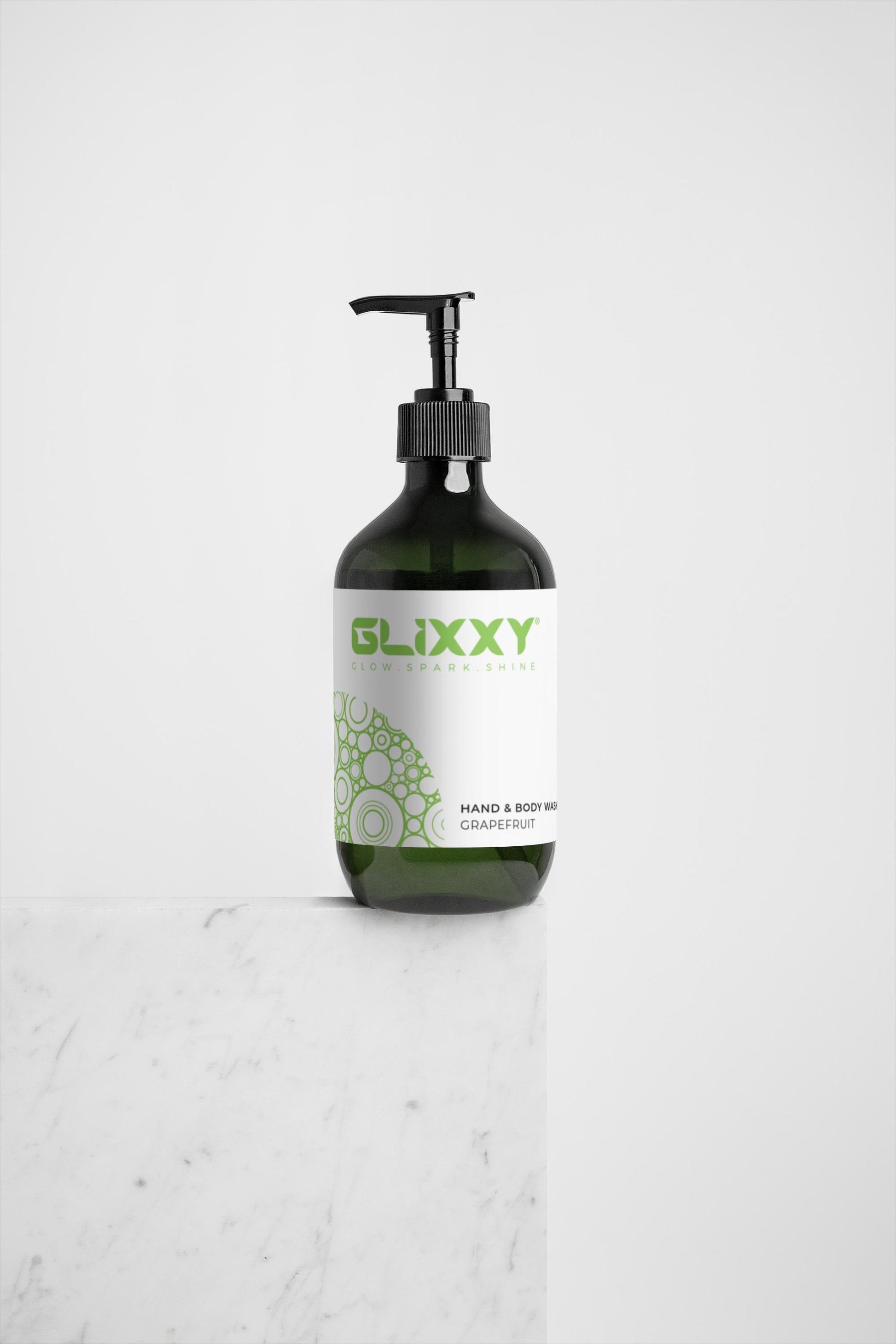 Glixxy hand and body wash bottle on a white background