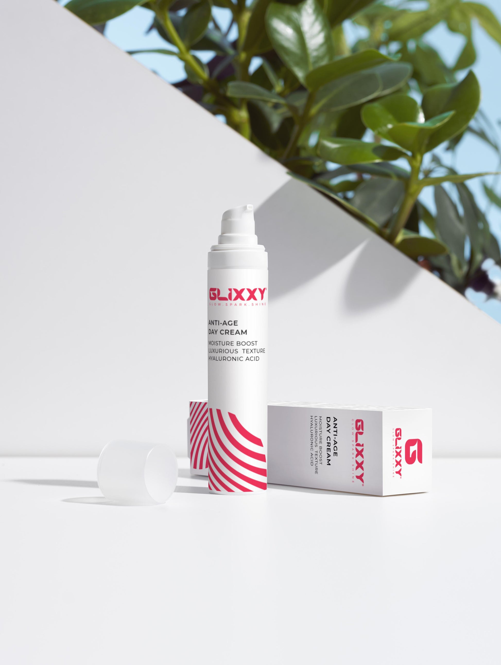Glixxy skincare product with packaging on a white background. The Age-Defying Trio Collection Box.