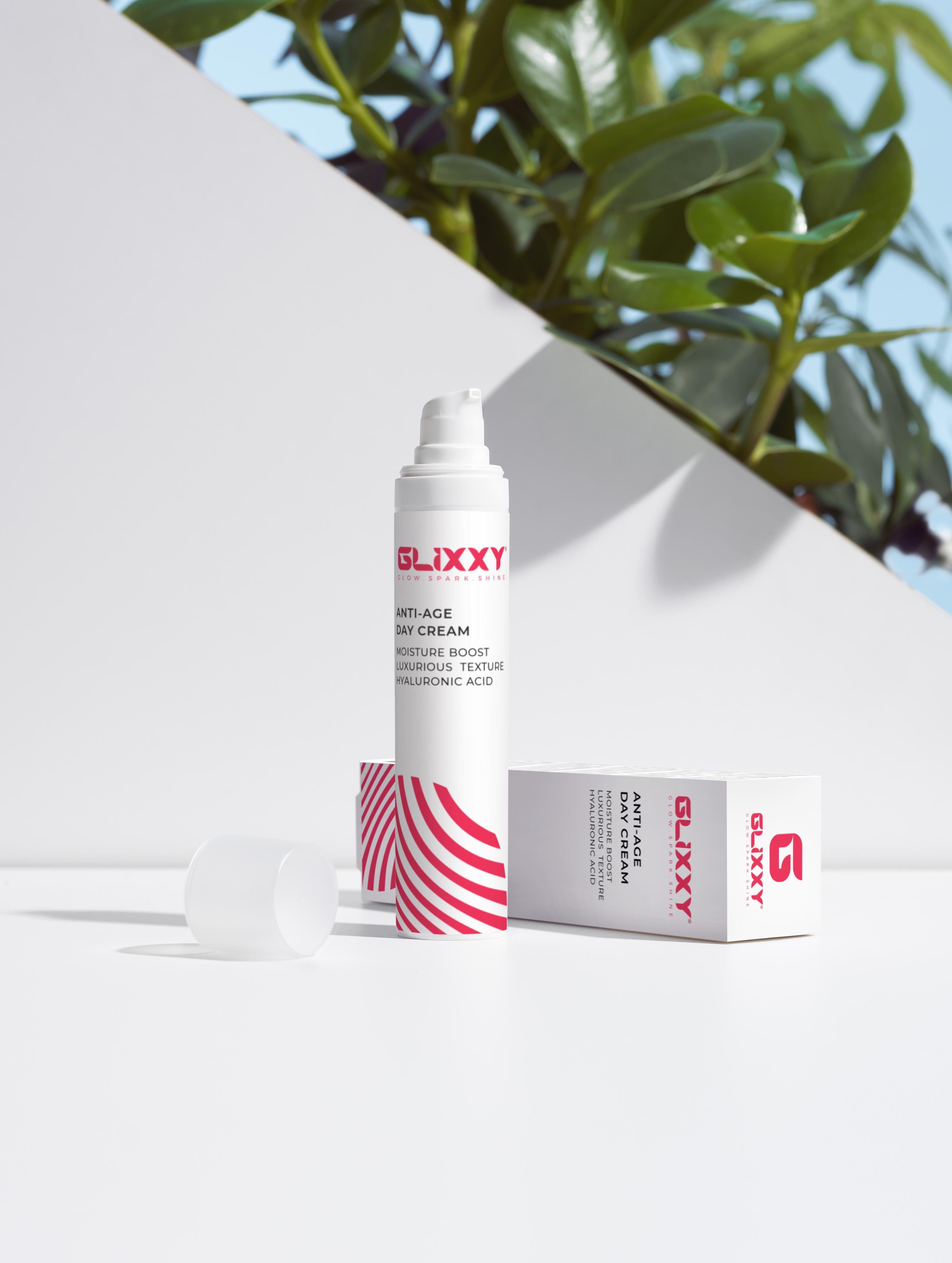 Glixxy skincare product with packaging on a white background. The Age-Defying Trio Collection Box.