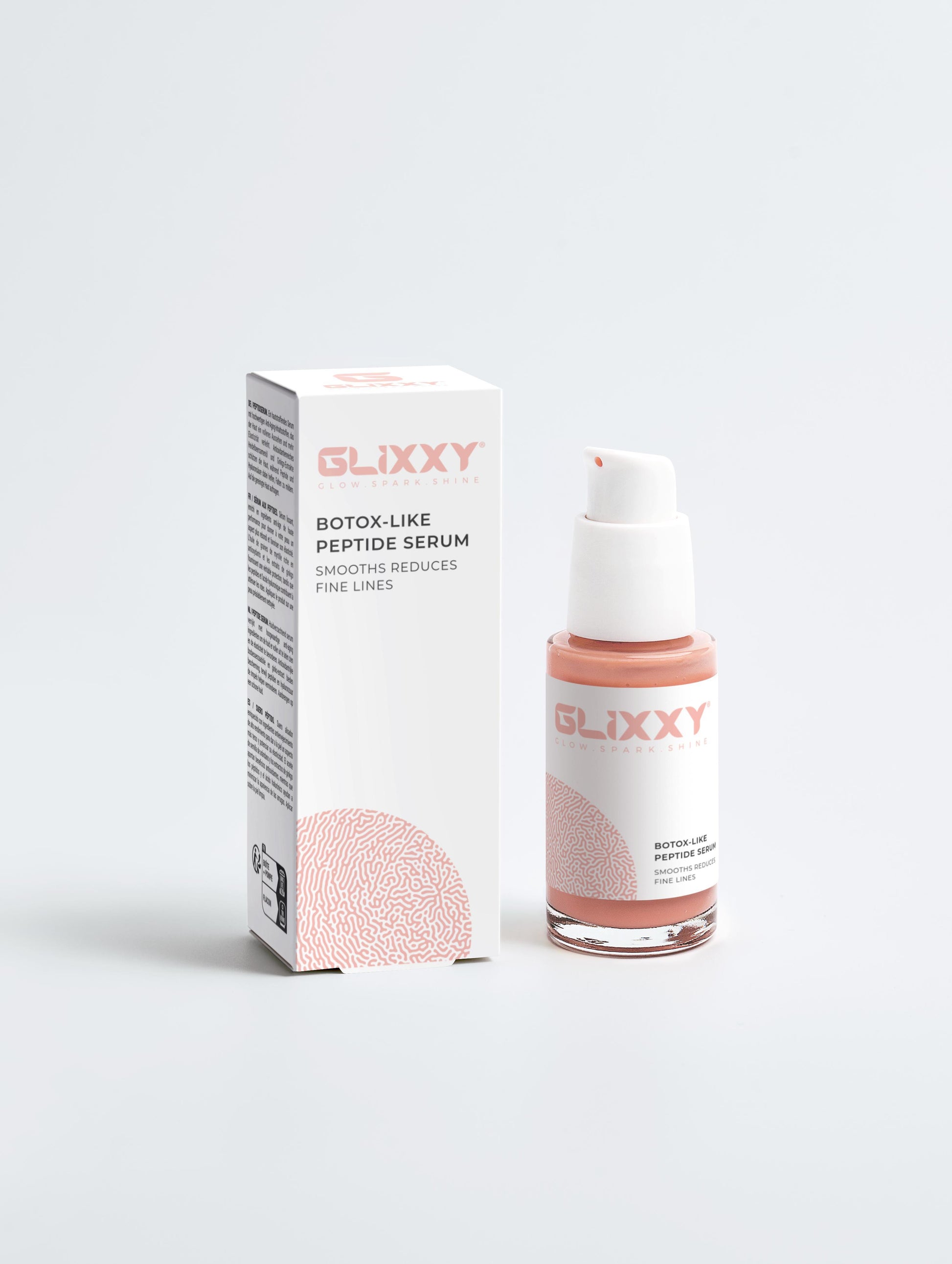 Glixxy serum bottle and packaging on a white background