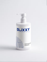 Glixxy sensitive scalp shampoo bottle on a light gray background