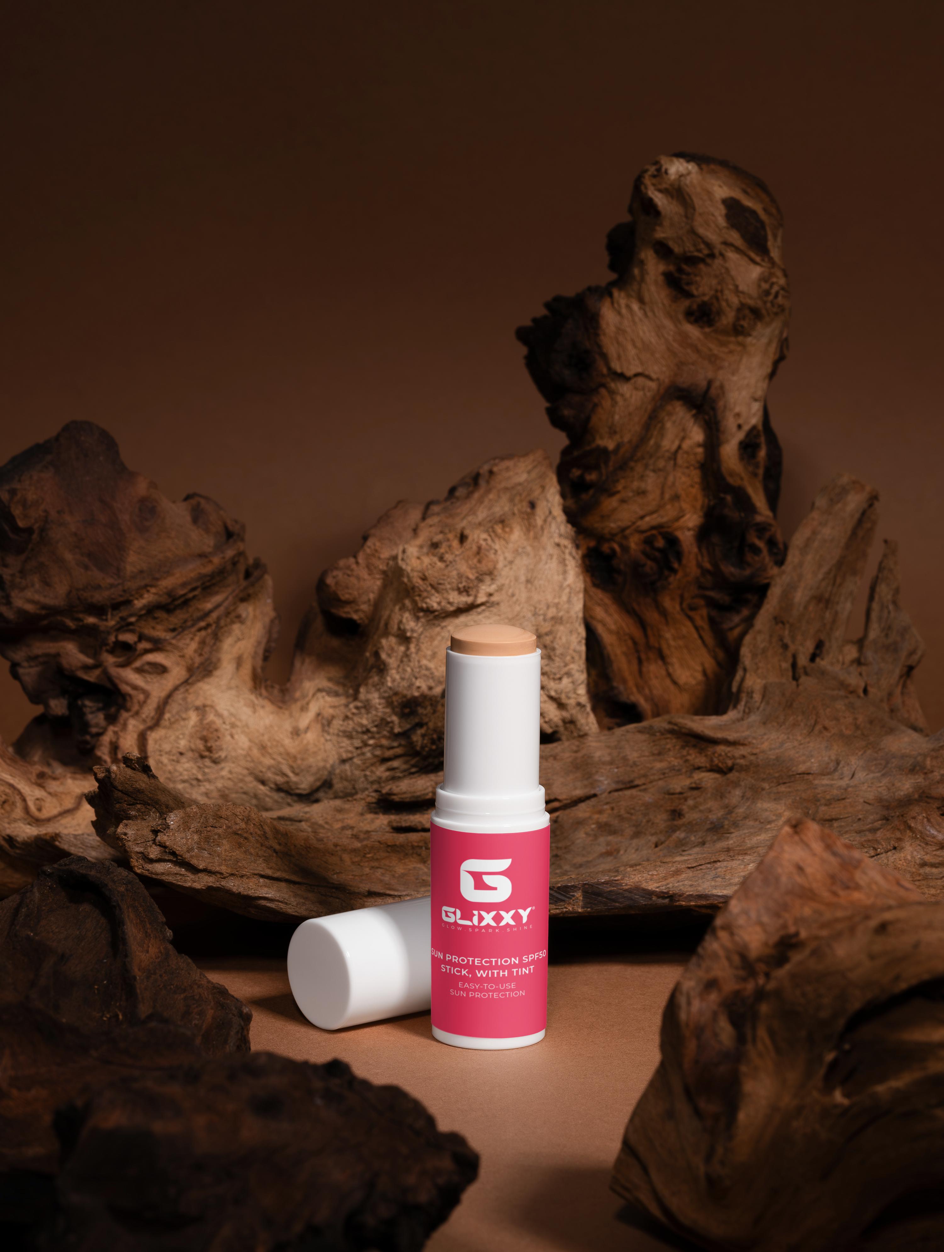 sun protection stick spf 30 with wooden background by Glixxy