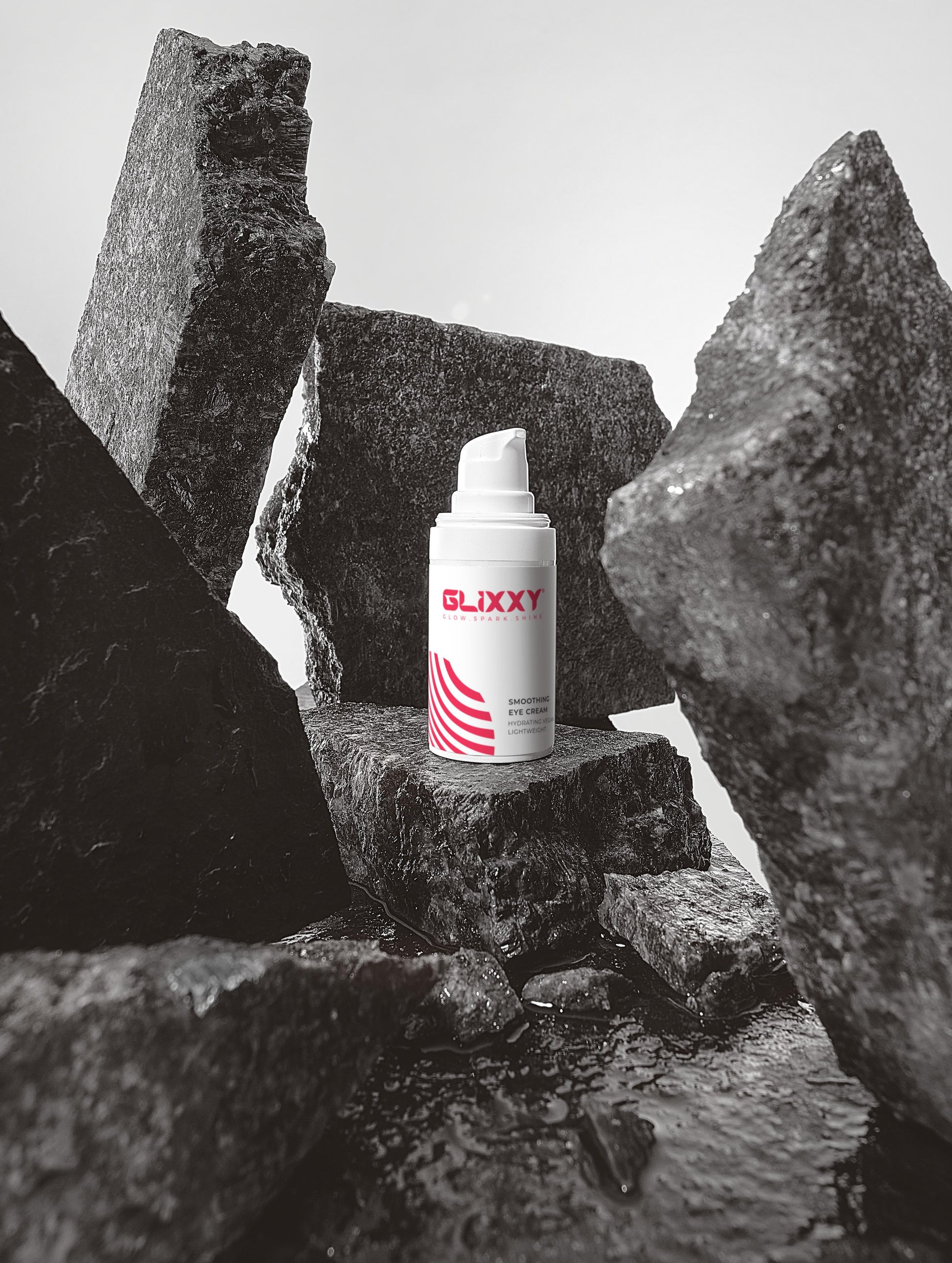 Glixxy product on a stone surface with a black and white color scheme